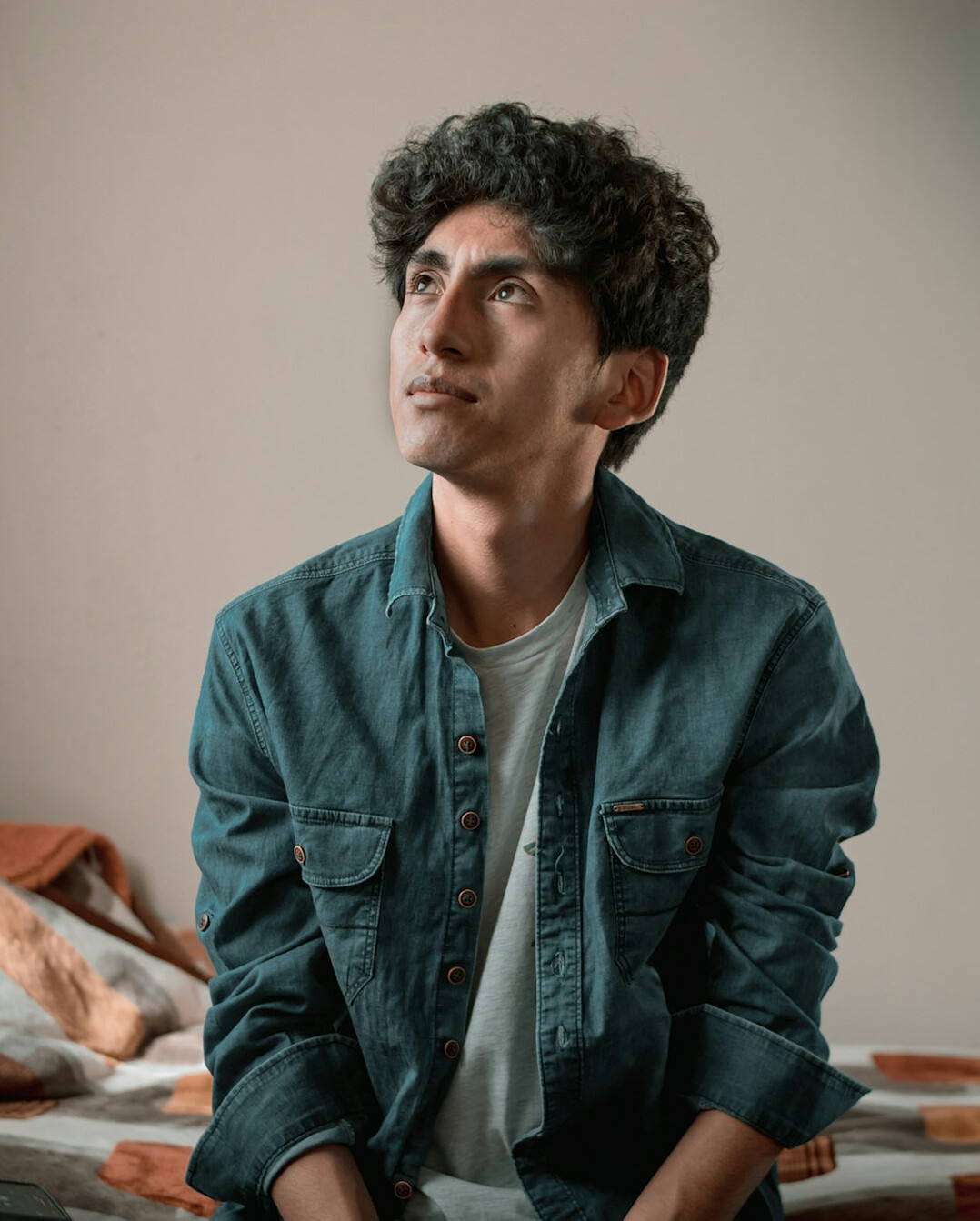 Portrait of a man in a shirt with a neutral background