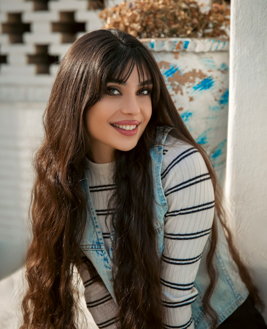 Portrait of a smiling woman with long hair